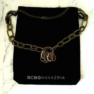 Beautiful BCBG Gold Hoops Necklace 25"long.